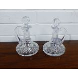 A pair of crystal decanters and stoppers, 15cm high, (2)