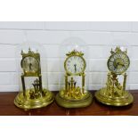 A group of three Anniversary clocks with glass domes, (3)