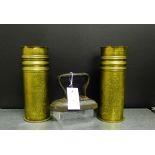 A pair of trench art vases and a small iron, (3)