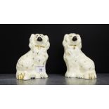 A pair of Royal Doulton chimney spaniels of small proportions, 15cm high, (2)