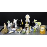 A mixed lot of figurines and animal figures to include Poole, Szeiler and Rushton pottery Isle of