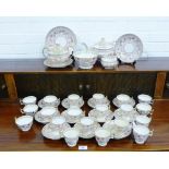 A quantity of 19th century English porcelain tea and coffee service, the pink ground with gilt