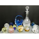A collection of paperweights to include Caithness and Mdina, together with a decanter and stopper