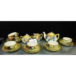 A Japanese lustre tea set, (20)