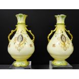 A pair of Crown Devon blush ivory twin handled vases, 25cm high, (2)