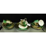 A continental silver lustre porcelain teaset with a green fish scale reserve, (a lot)