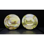 A pair of Royal Worcester hand painted cabinet plates, one depicting Kilchurn Castle, signed D.