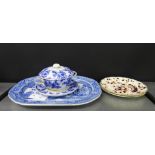 A Staffordshire blue and white willow pattern ashet, together with a blue and white pot on stand and