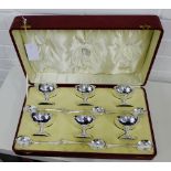 A set of six Epns coupes, together with a set of six spoons in a red leather fitted case