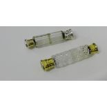 A Sampson and Mordan cut glass double ended scent bottle with gilt metal mounts, 15cm long, together