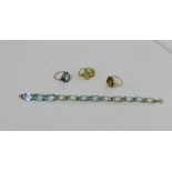 Two 9 carat gold gemset dress rings together with a bracelet and seed pearl openwork brooch (4)