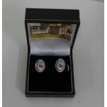 A pair of Gent's silver cufflinks, bearing an enamel Ogilvy family crest, with Hamilton & Inches