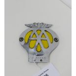 A vintage AA badge