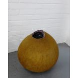 A stoneware garden sphere with a glazed well, 55cm high