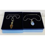 Two contemporary silver and coloured hardstone pendant necklaces, boxed (2)