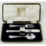 An Epns 'child's' cutlery set comprising knife, fork, spoon and napkin ring, in original leather