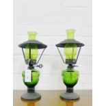 A pair of green moulded glass oil lamps,43cm high, (2)