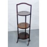 A mahogany three tier folding cake stand, 88cm high