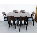 A retro Meredew dining suite comprising a set of six dining chairs with shaped backs and blue