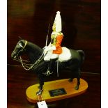 A Connoisseur model by Beswick - Lifeguard, a Trooper in mounted review order dressed for ceremonial