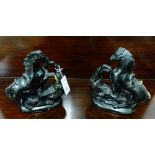 A pair of Bo'ness style black glazed horse figures, 24cm high, (2)