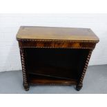 A 19th century rosewood open bookcase, the rectangular top with gadrooned edge, flanked by barley