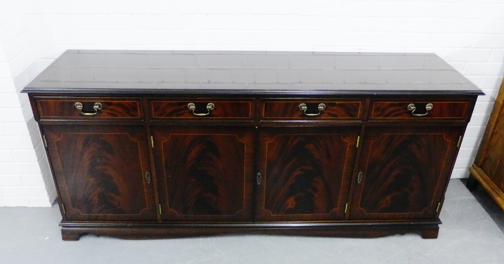 Modern mahogany sideboard, fitted four drawers over four cupboards, 82 x 184cm