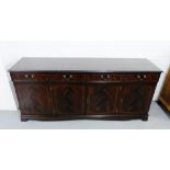 Modern mahogany sideboard, fitted four drawers over four cupboards, 82 x 184cm