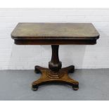 A 19th century rosewood fold over tea table, on a facet column and quadripite base, 76 x 96cm,