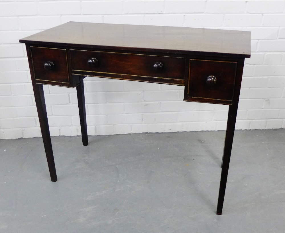 A mahogany three drawer side table, 74 x 92cm