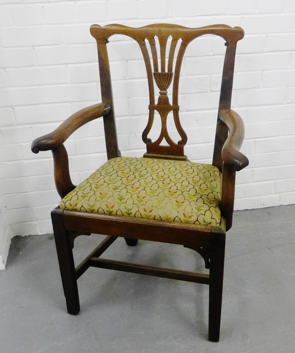 A mahogany open armchair, the shaped toprail above vertical splat back, with upholstered seat, 92