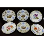 A collection of four 19th century English porcelain plates with gilt lined scalloped edge and