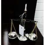 A silver plated set of miniature scales