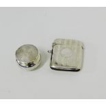 An Edwardian silver vesta case together with a Birmingham silver pot with an engraved top, (2)