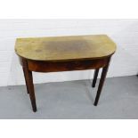 A mahogany D end table, raised on square tapering supports, 72 x 94cm