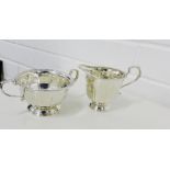George V silver fluted cream jug and twin handled sugar bowl, makers marks for Adie Brothers,