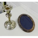 Birmingham silver candlestick together with a contemporary Sheffield silver oval photograph