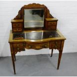 A 19th century rosewood and inlaid dressing table, the shaped top over a central mirror flanked by