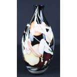 Emma Bosons / Moorcroft Pottery = A trial Folies Bergere vase decorated with female figures on a