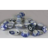 A quantity of Chinese and Japanese blue and white porcelain including a Japanese coffee pot and