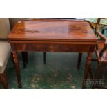 A late Victorian flame mahogany card table on tapered reeded legs, 83 x 41 x 71cm