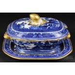 A Copeland Spode blue & white printed small tureen & cover with stand, decorated in New Bridge or