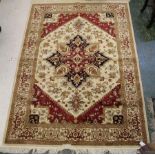 Heriz carpet - beige ground with central eight pointed reserves, floral/foliate design throughout,