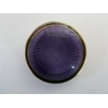 A small antique guilloche enamel and silver pill box, c1910, of circular shape,