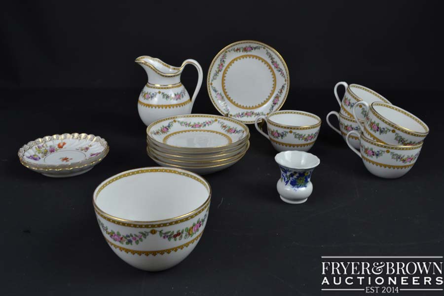 A Spode part tea service, R411 pattern of floral swags within chain and stiff leaf borders, retailed