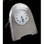 A small silver mounted desk clock, Birmingham 1915, makers mark W.V & S, the white enamelled dial