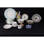 A quantity of decorative ceramics including a Continental porcelain chestnut basket in Chelsea