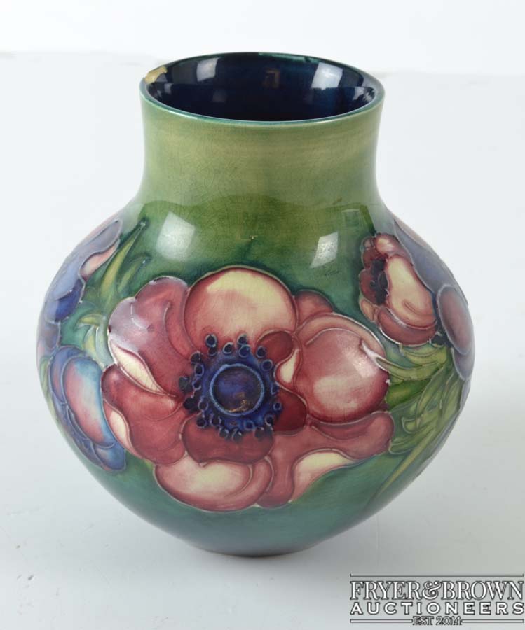 A Moorcroft Anenome pattern vase, globular with short cylindrical neck, impressed mark and green