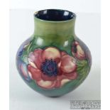 A Moorcroft Anenome pattern vase, globular with short cylindrical neck, impressed mark and green