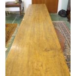 A very large elm refectory table, on tapered square legs, 360 x 65 x 73cm